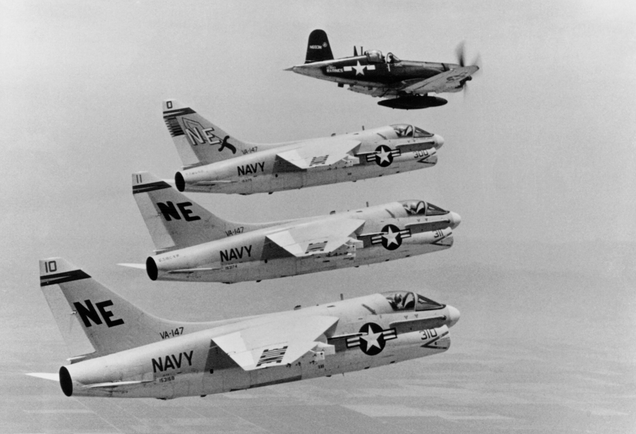 Family photo: a F4U Corsair flies alongside a trio of A-7 Corsair IIs prior to the A-7's first deployment to Southeast Asia in 1967 (US Navy)